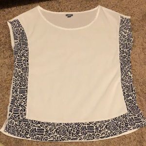 White and navy top